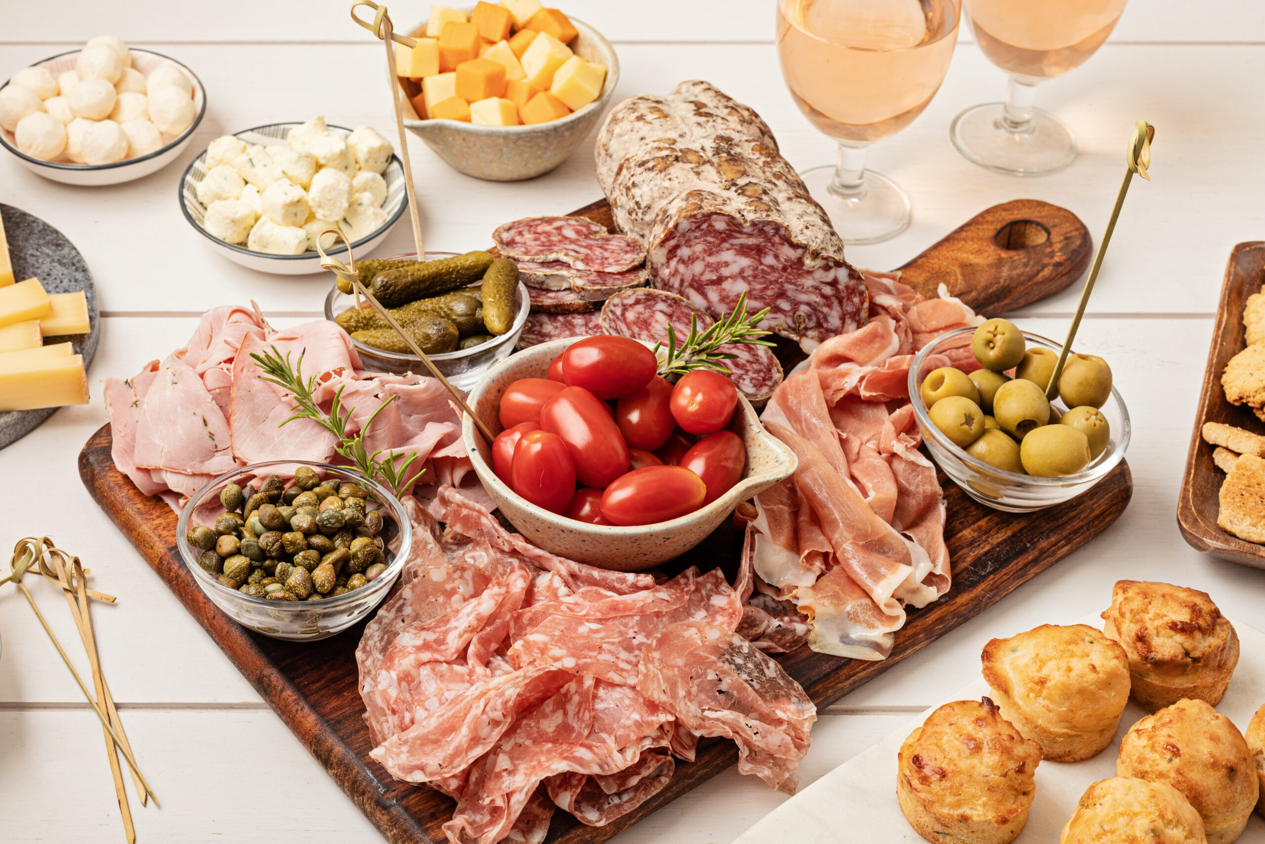 Appetizers table with different antipasti, charcuterie, snacks, cheese