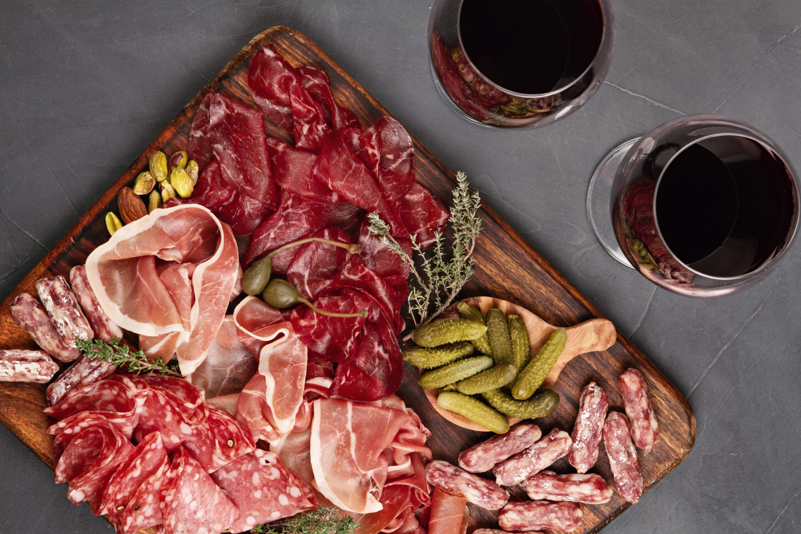 Appetizers table with differents antipasti, cheese, charcuterie,